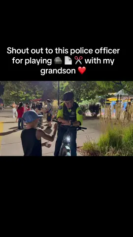 My grandson had fun playing everyone rock paper scissors but especially with the 👮 ❤️#idahostatefair #policeofficersoftiktok 