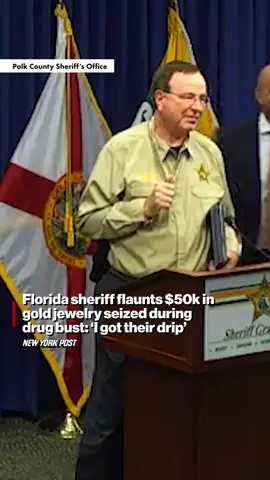 A Florida sheriff donned an alleged drug kingpin’s gold chain and bracelet while blasting the deadly trade that paid for his bling. Details at the link in bio.