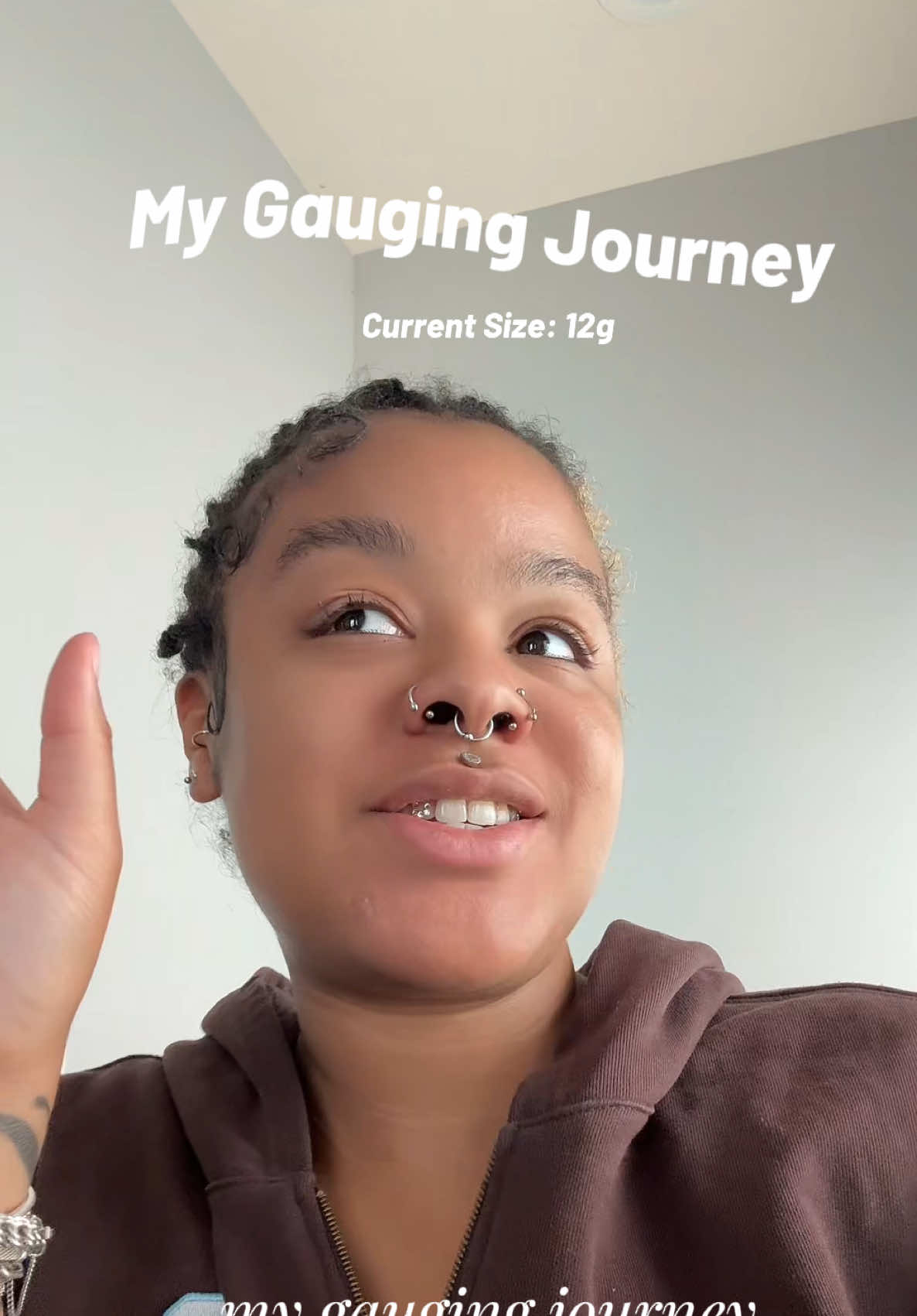 She’s at a 10 gaugeeee. Not a lot of pain and discomfort so far I’m trying to remain slow and steady. I really like the silver earring they are my tea. Lmk any tips in the comments 👍🏽 #gauges #piercings #earrings #gaugingmyears 