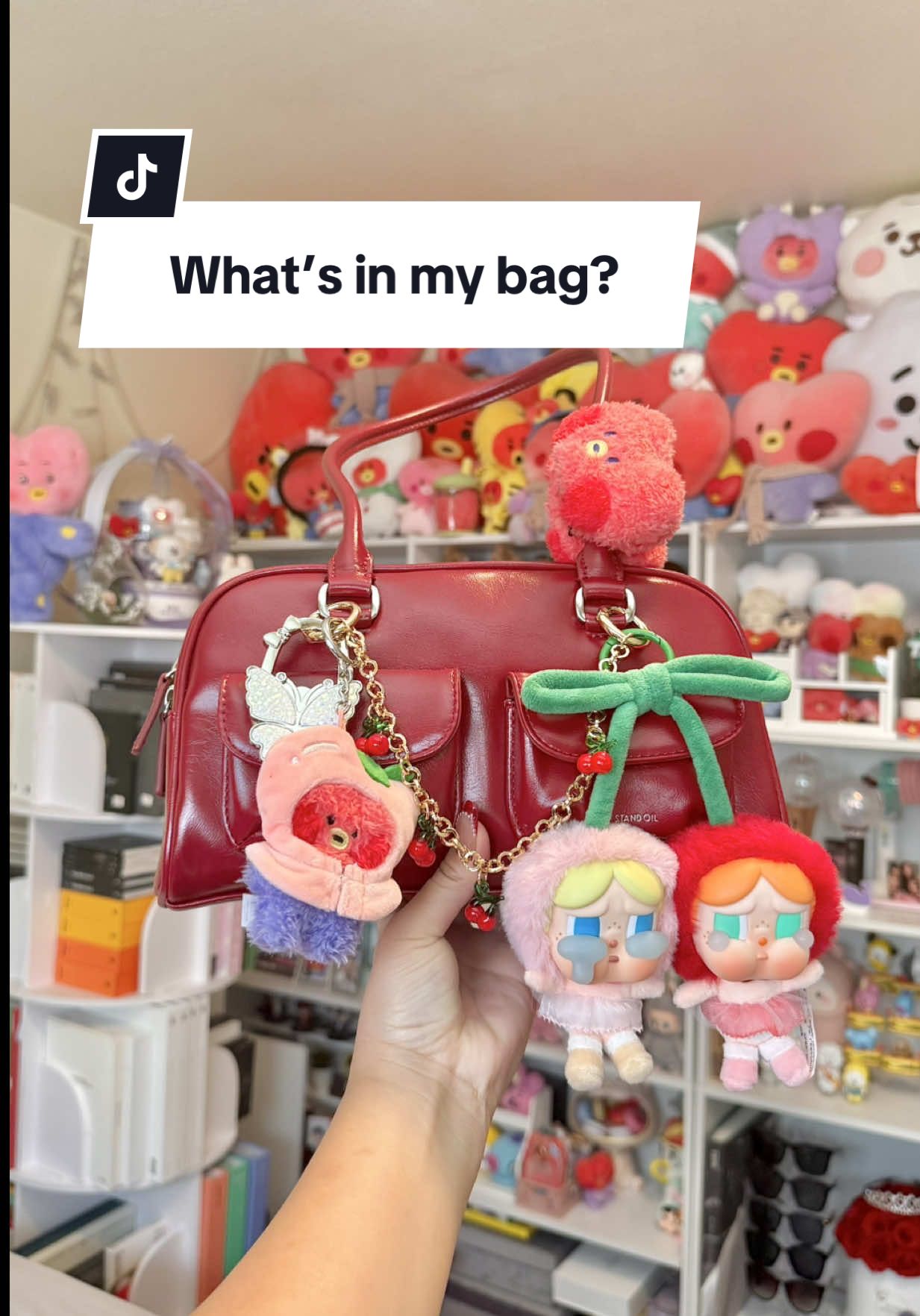 what’s in my bag??? items 👇🏻 - bag @standoil  - crybaby keychain @POP MART US  - cherry bag charm @Marshalls  - TATA keychain @LINE FRIENDS  - butterfly bag holder @SHEINUS  - TATA hair clip, BT21 bandages, TATA ear plugs, TATA PC holder @LINEFRIENDS SQUARE  - BT21 PC holder @Cakeworthy  - BTS wallet @moonjuji_  - film camera @Kodak Photo Printer  - portable charger + light @ATEEZ_Official  - body & hair mist @touchland  - hand sanitizer spray (gifted by my sister) - ooops mirror @MINISO United States  - liquid IV @Liquid I.V.  - choco pie & kopiko @H Mart  - AirPod @apple  - AirPod case @linefriends_us  - sun stick @YesStyle  - perfume @YSL Beauty @chanel.beauty  - breath mist @Crest  - lip products @yslbeauty @Diorbeauty @the crème shop  @와이엔엠 YNM Official  #whatsinmybag #bag #cutethings #justagirl #btsarmy  