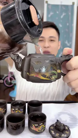Bộ ấm chén pha trà đổi màu