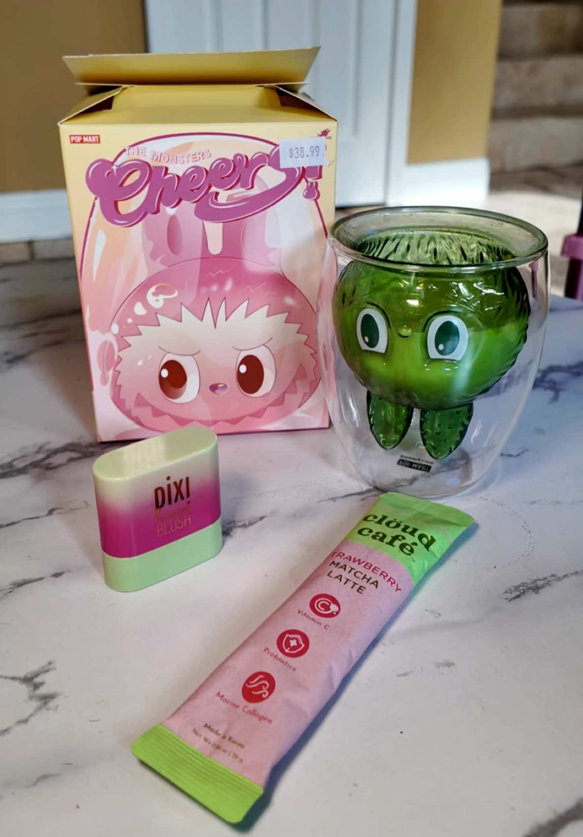 Find the labubu cup at @TheLabuTiqueShop 🍵🍓  Essentials to start my week @Clöud Café Official Strawberry Matcha & @Pixi Beauty mini blush  #labubu #popmart #matcha #pixibeauty #strawberrymatcha 