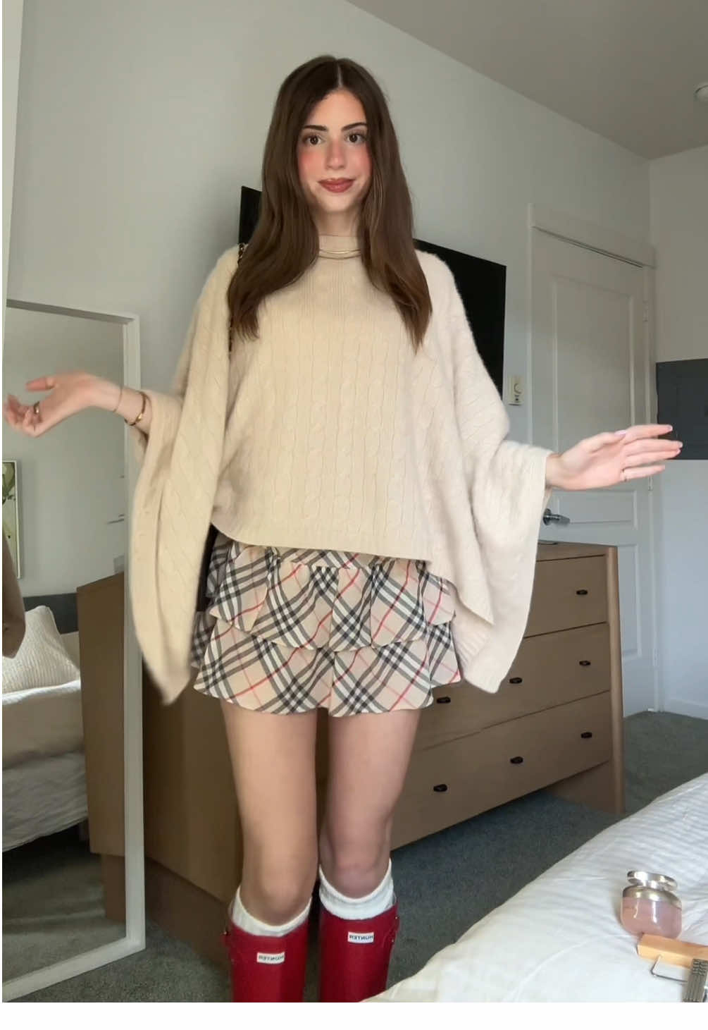 tank @Brandy Melville  shorts @Edikted  skirt @Burberry blue label poncho @Ralph Lauren  perfume @Rare Beauty  boots @Hunter Boots #gdwm #poncho #falloutfit #fallfashion #outfit 