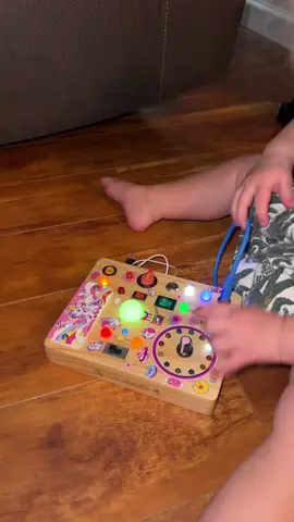 Montessori toy busy board for littles! We take this everywhere!! #busyboard #montessori #montessoritoys 