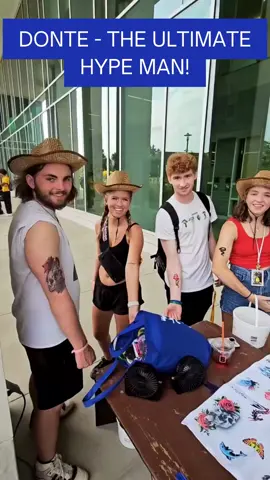 Not a TBT... just a classic. Donte’s been hyping up college crowds since before most of them even knew what airbrush was. No surprise he's one of our most requested artists on Team AE. 🔥 Tattoos? Fresh. Vibes? Even fresher. #WesternMichiganUniversity #AirbrushTattoo #EventEntertainment #TeamAE #CampusVibes #CollegeEventIdeas