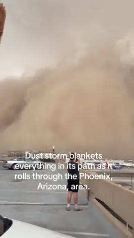 Dust storm blankets everything in its path as it rolls through the Phoenix, Arizona, area.