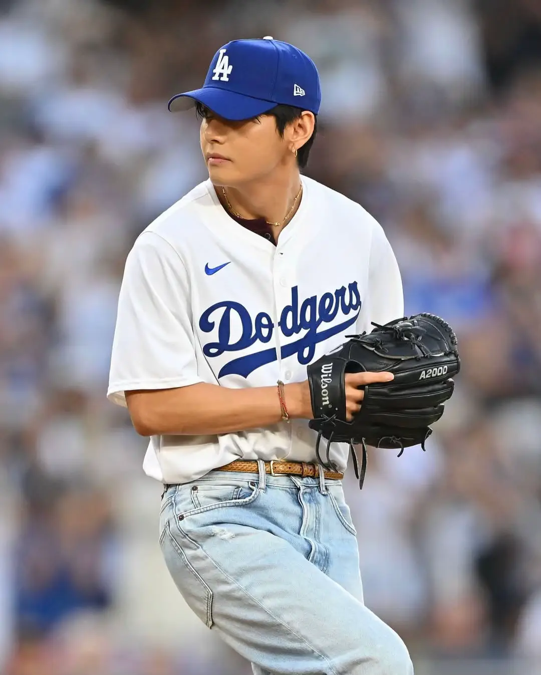 LOOK: BTS V kicks off the game with the first pitch at the Dodgers vs. Reds matchup on Tuesday. 📷 MLB/Instagram