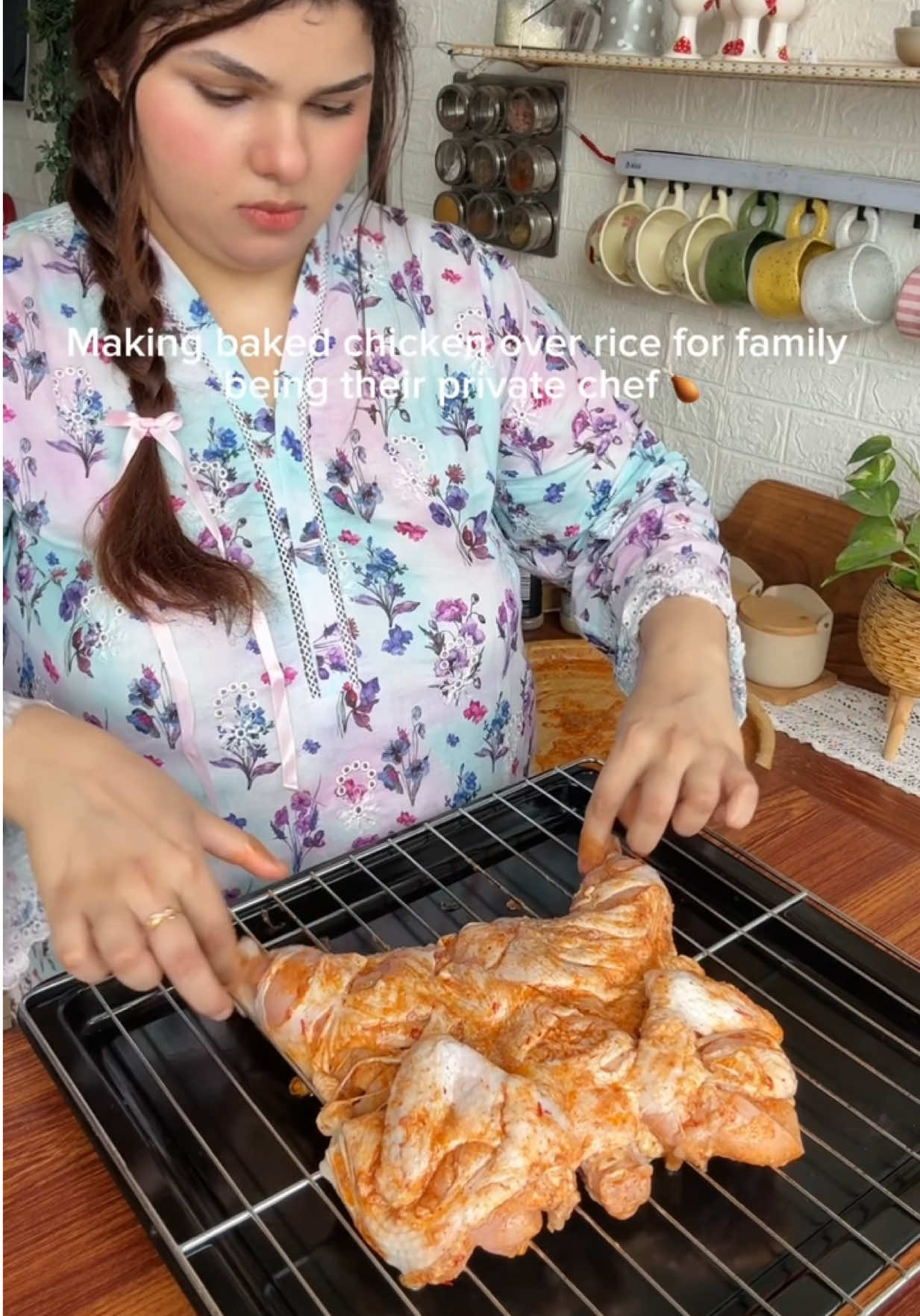 Baked chicken over rice Eat or Pass?!👩‍🍳🍗 • 1.2 kg Chicken  • Lemon slices • Salt  • Bay leaf/star anise/Cinnamon  • Water Leave over night in refrigerator  Marination: • 1/4 cup Yogurt • Olive oil as required  • 2 tbsp Garlic paste • 2 tbsp Chilli paste • Salt • 1 tsp Garam masala  • 2 tsp Paprika  • 2 tsp Black pepper  • Lemon juice Rice: • 1 cup Rice • Salt to taste • 2 tsp Chicken powder  • Food color Salad: • Onion • Tomato  • Coriander  • Salt & Lemon Juice  • Bake chicken on 200C• for 30mins then add soaked rice and bake for more 30-40mins on 200-280C•  • • • #that_fooodie_girl  #bakedchicken #whattowatch #tiktokkekhanay #lunch 