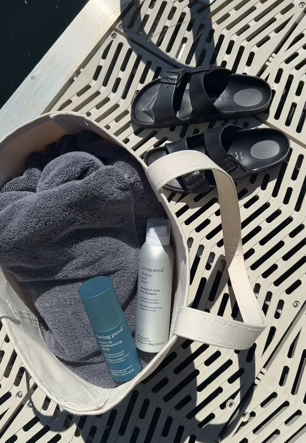 Just like my wardrobe, I keep my vacation hair routine minimal. For a week on the lake, I only packed two essentials from @Living Proof, Inc. Minimal products, maximum results.  #LivingProofInc #livingproofpartner 