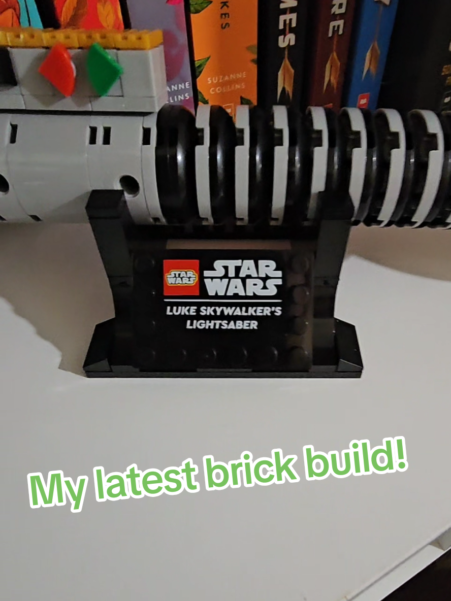 This is a fun way to treat yourself or a great gift for someone else! Now to decide if Luke Skywakers Lightsaber is going to live on my bookshelf or Hubby's computer desk....  #lightsaber #brickbuild #build #gift #lukeskywalker 