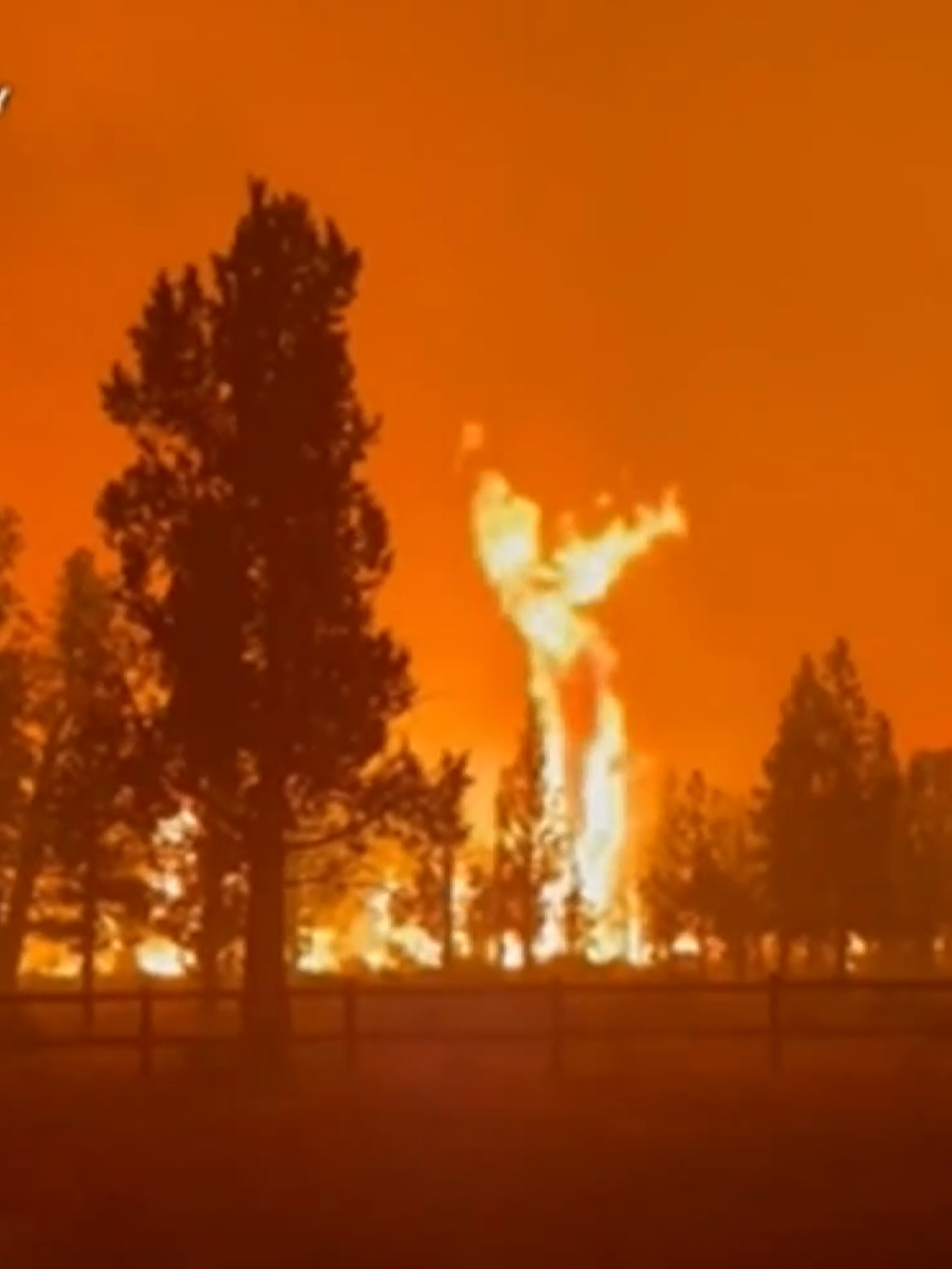Extreme weather in the West took a dark turn when a massive gray dust storm hovered around Phoenix. The intense heat also is fueling large wildfires in Napa County, California, where flames are threatening the wine industry’s grape crops.