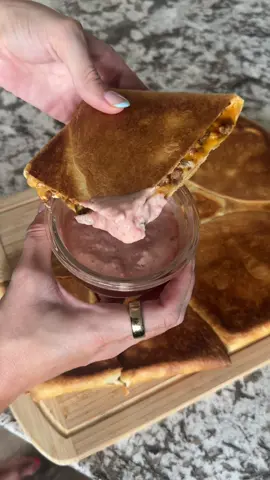 we had these for dinner last night and they are sooo good 🤤🌮  here’s the super simple recipe! Cook your ground beef with a taco seasoning packet and 1/2 cup water. Place extra large tortillas on a baking sheet, then layer your toppings: -queso cheese sauce  -ground beef -shredded cheese -crushed tortilla chips  -shredded lettuce  -tomatoes  -sour cream Then fold your tortillas up, brush with melted butter and place another baking sheet on top. Place in a preheated oven at 420 for 15 minutes then remove the baking sheet and bake for 5 additional minutes. Serve with salsa and enjoy! 🌮🙌🏼 #MomsofTikTok #DinnerIdeas #cookwithme #tacobell #Recipe 