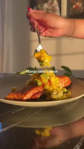 Seared salmon with pineapple mango salsa is one of my FAVE work week dinners 🐟 also how many times can I say dice in a video  Salmon seasonings Salt Garlic powder Onion powder Chile powder Cumin Smoked paprika Salsa 3 mangos  1/2 of a pineapple  1 avocado  1 habenero  1/2 of a red onion Cilantro  1 garlic clove  Juice of a lime  Salt #dinner #Recipe #cookwithme #summerrecipes #salmonrecipe #salmon #salsa #mango #mangosalsa 