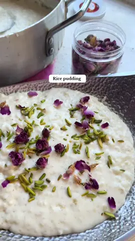 Ingredients:  Butter  Ground cardamom  Whole milk  Rose water Sugar Half and half  Heavy cream  Sugar ( add sugar as your mixing in but depending on how sweet you want keep adding in)    For garnish can you cardamom and edible flower bite #ricepudding #desserttiktok #Recipe #middleeastern #sweets 