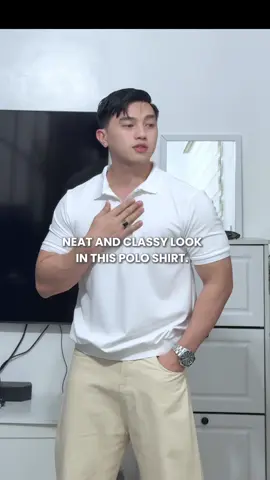 Serving a neat and classy look in this white zip-collar polo shirt. #poloshirt #poloshirtformen #whitepolo #menspolo #menspoloshirt 