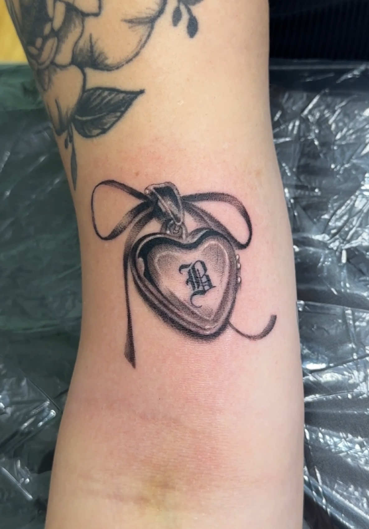Little bit of black and gray tattoo action 💜 got to tattoo this super cute locket today 💜