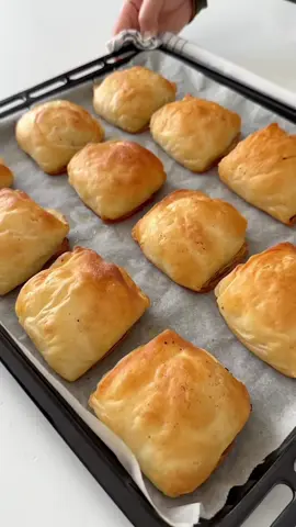 Soft & Fluffy Meat Börek | Family Favorite! This soft, layered meat börek is perfect for family meals! 🥘 Filled with seasoned minced meat, onion, and cheddar cheese. Try it today and impress everyone at the table! Ingredients Dough: 	•	1 cup water (200 ml) 	•	1 cup milk (200 ml) 	•	1 packet yeast (10 g) 	•	1/2 cup vegetable oil (100 ml) 	•	3 tbsp sugar 	•	1 tsp salt 	•	6 cups flour 	•	2 eggs (reserve yolks for brushing) 	•	1 tsp vinegar Filling: 	•	250 g minced meat 	•	1 large onion, chopped 	•	Salt, pepper, chili powder 	•	Cheddar cheese (optional) For layers & brushing: 	•	50 g butter, melted 	•	1 tea glass oil 	•	Egg yolk for brushing ⸻ Instructions 	1.	Make the dough: Mix water, milk, yeast, sugar, oil, vinegar, eggs, salt, and flour. Knead until soft. Let rise 1 hour. 	2.	Prepare filling: Cook meat and onion with salt, pepper, and chili. Add cheese if desired. 	3.	Assemble: Roll dough into 6 thin sheets. Brush with butter+oil, layer filling between sheets, finish with top dough. Brush with egg yolk. 	4.	Bake: 180°C (350°F) for 35–40 min until golden. #fyp #viral #FoodTok #Recipe #tutorial 