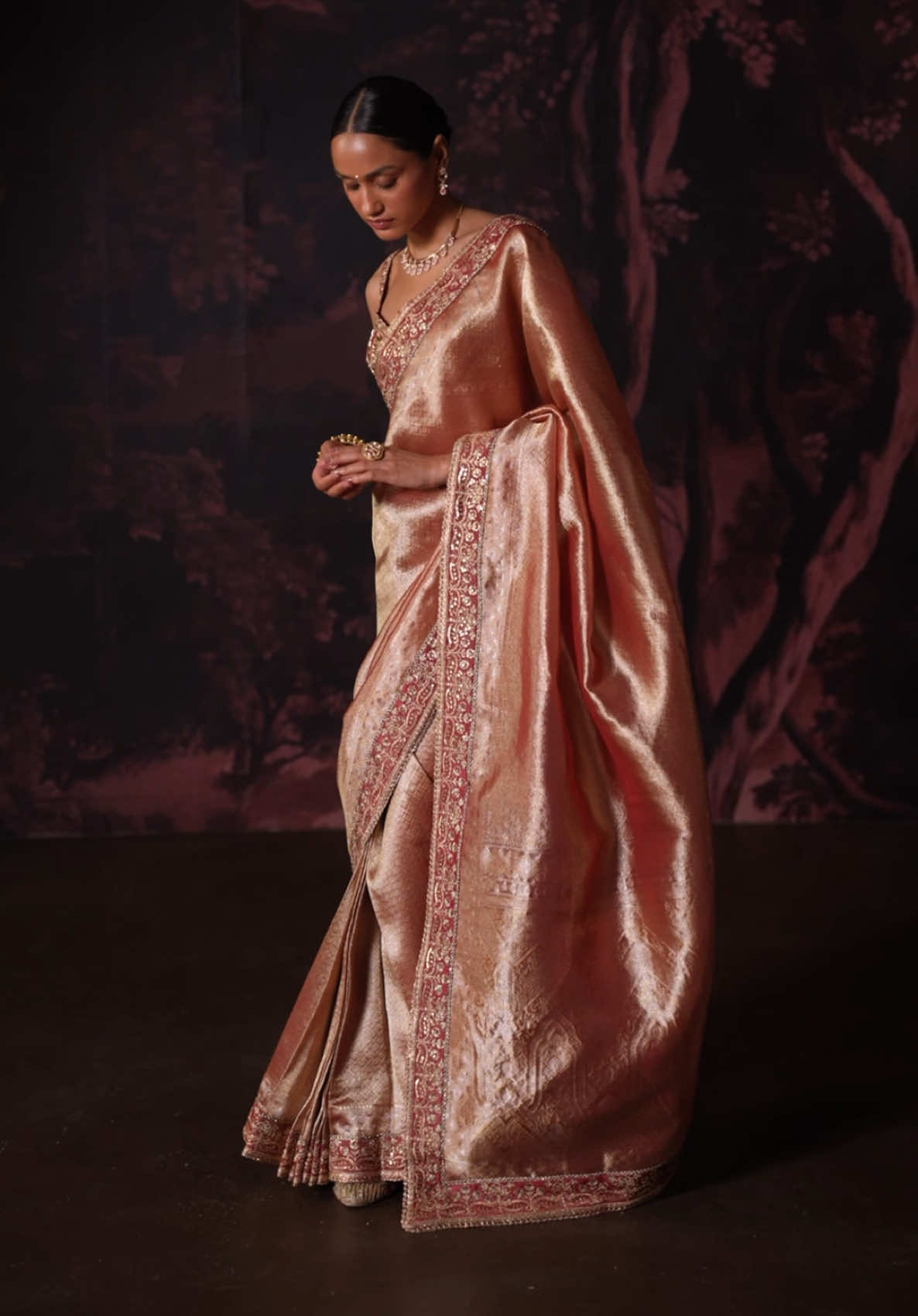 Presenting our Metallic Rose Pink Embroidered Tissue Saree crafted on viscose tissue organza. #indian #saree #lashkaraa 