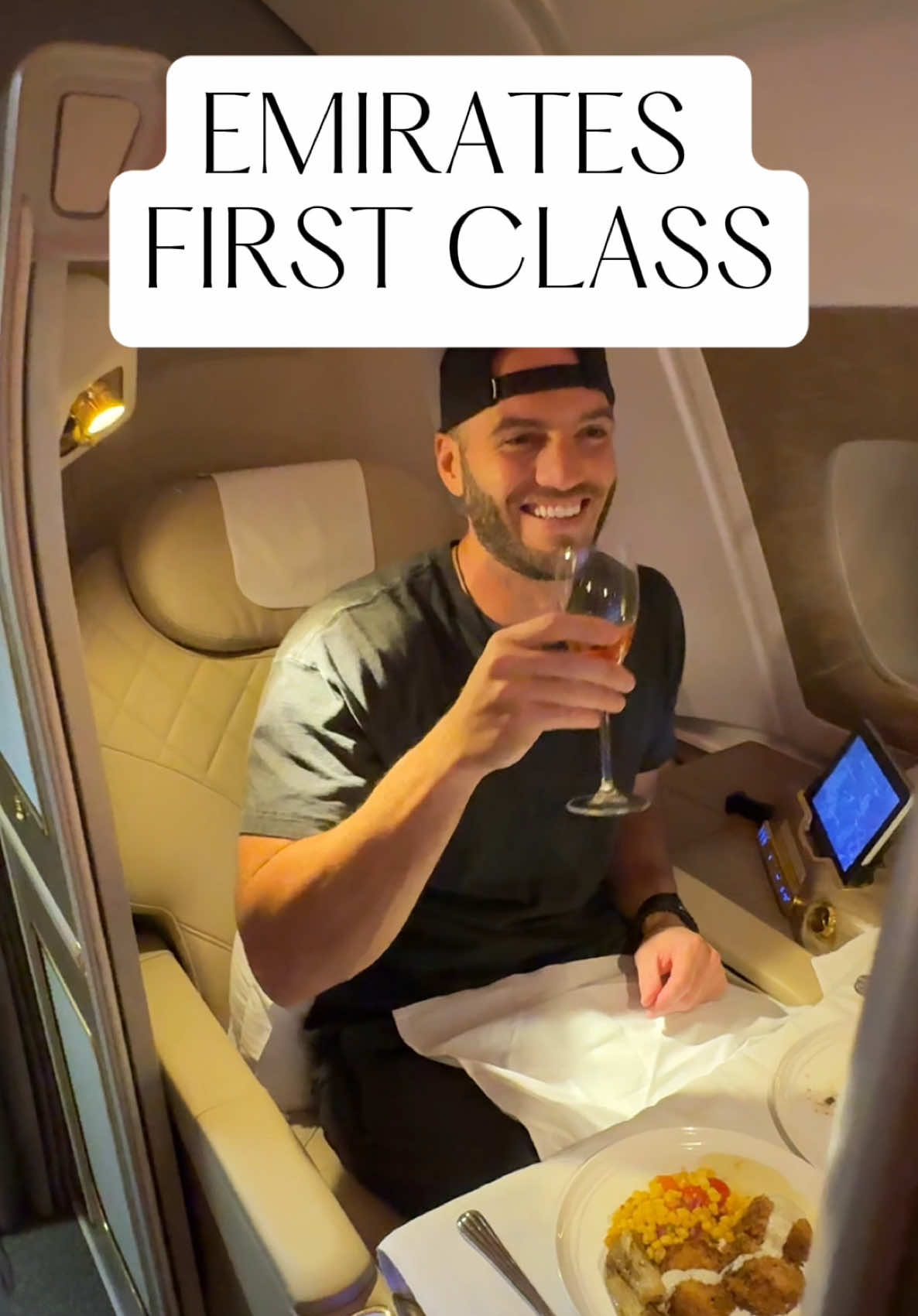 This Emirates first class seat comes with a shower, fine dining, and a lie flat bed. It normally costs around $15,000 to fly. But using miles and points strategies it can be booked for much cheaper! #emirates #emiratesfirstclass #emiratesfirst #firstclass