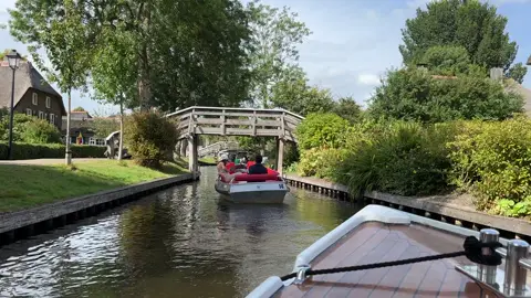 Giethoorn, The Netherlands. “Venice of The Netherlands “. A magical village with tons of charm and 285 foot bridges. #travel #giethoorn #canals #thenetherlands #boatcruises 