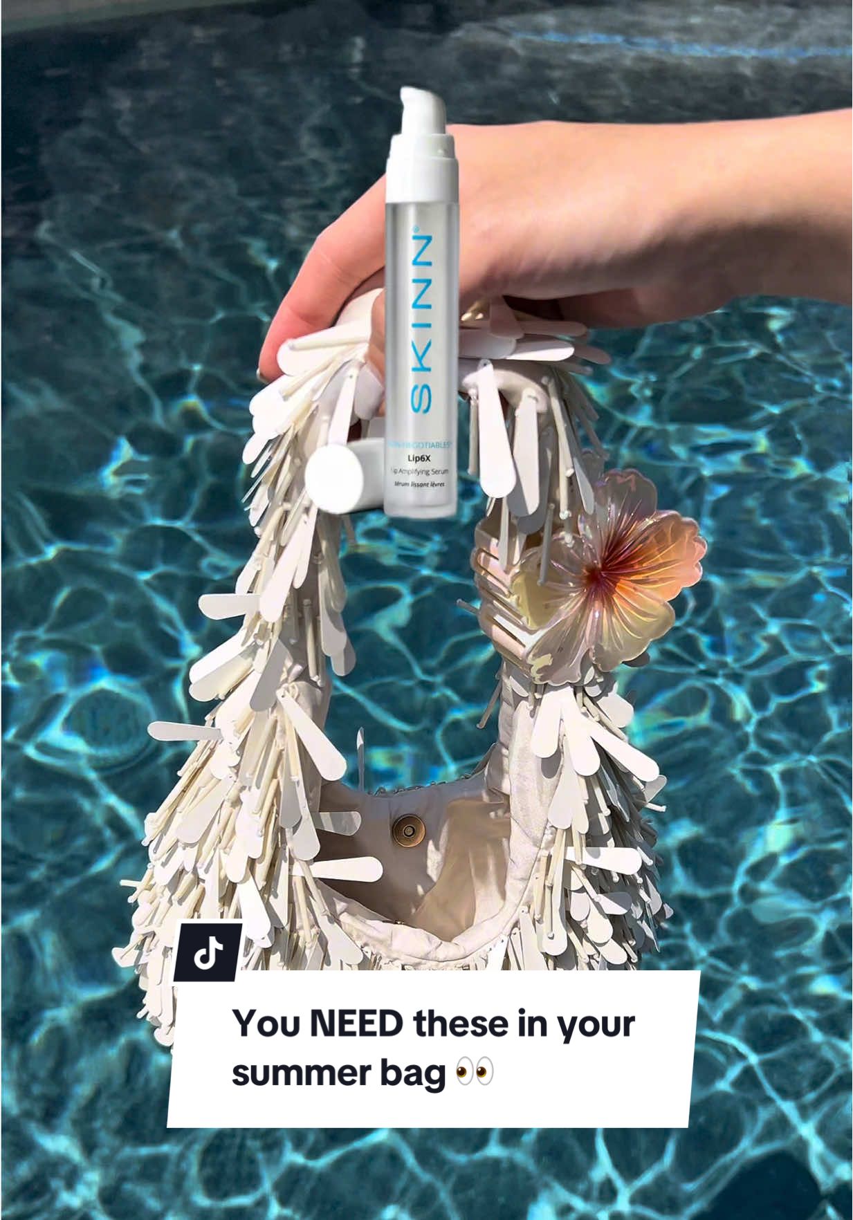 This is THE summer bag you didn’t know you needed… packed with SKINN  must-haves. 🌞✨ #v#viralproductss#skincareroutine#w#whatsinmybagf#fypsummertok 