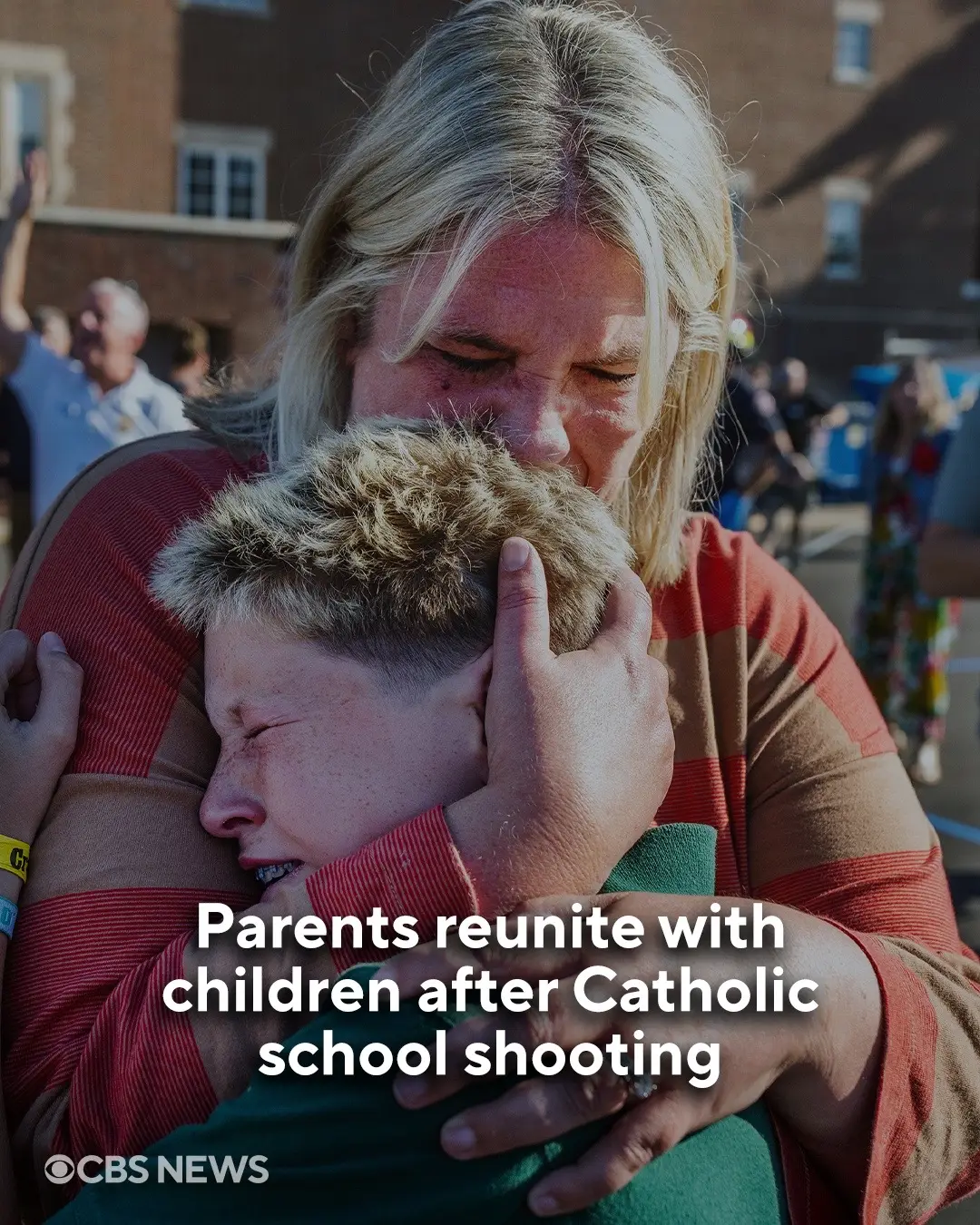 Parents rushed to their children, hugging them through tears, outside the Annunciation Catholic School in Minneapolis after a gunman opened fire during the church's back-to-school Mass. An 8-year-old and a 10-year-old were killed, and 17 others were injured, including 14 children. Authorities say the gunman approached from the outside of the building and fired a rifle through the church windows towards children and worshippers. #breakingnews 