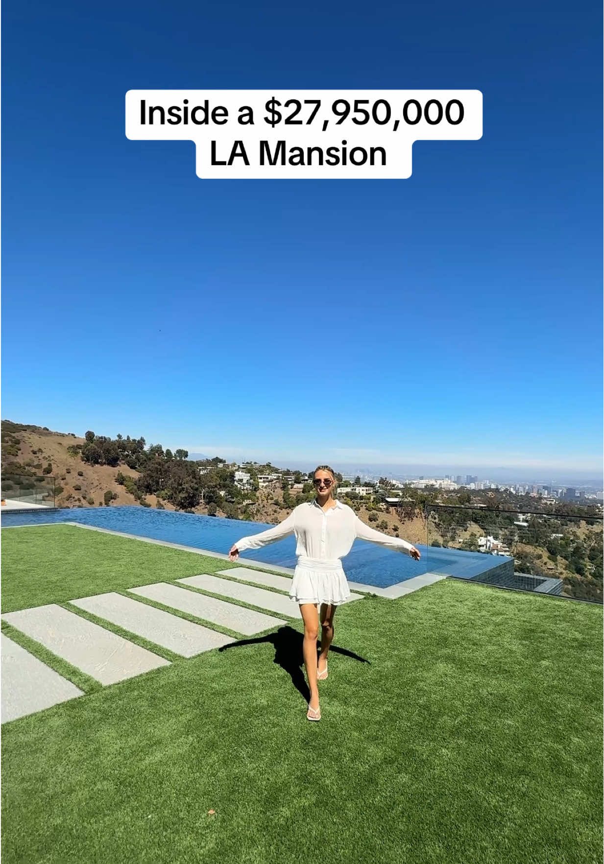 This house is a vibeeee! $27,950,000 and listed with Cindy Ambuehl and designed by Landry Design Group. Dress from @Showpo. #larealestate #lahousetour 