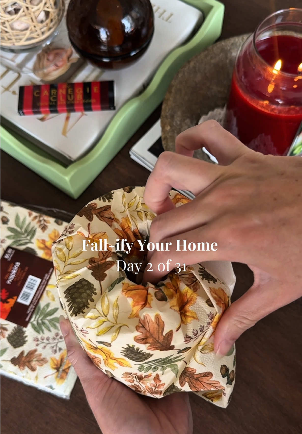 Sanitary & festive 🍂🧻 Day 2 of 31 | #k8newyorkfall  Covering extra rolls with paper dinner napkins is a clean & festive way to keep your bathroom ready for guests!  #falldecor #fallhomedecor #bathroomdecor #falldiy 