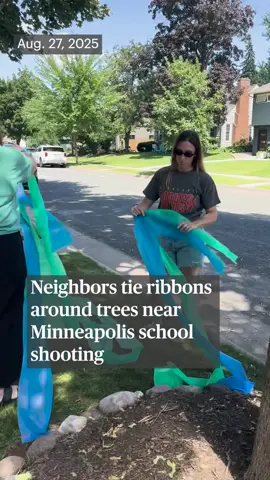 Community members are tying ribbons around trees near Annunciation Church in south Minneapolis, where two children were killed in a shooting Wednesday morning.  The shooter injured 17 people, 14 of them children. The shooter died from a self-inflicted gunshot wound at the scene, police said. Follow live updates at the link in our bio. Video by Elizabeth Flores @lizrflores/The Minnesota Star Tribune.