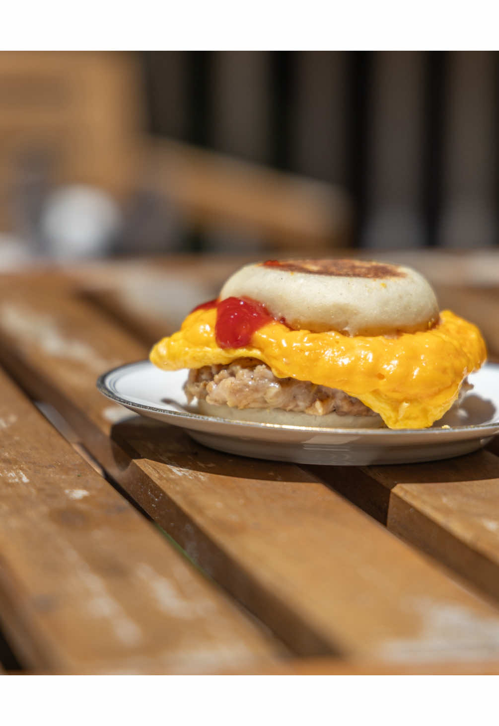 Who needs a drive-thru when your kitchen can do it better? Sometimes all you need is a little breakfast sandwich on an English muffin. And making your own muffins? Totally worth it. The best part-you can prep the dough the night before and bake them fresh in the morning. For the sandwich, we’re whisking up fluffy @Organic Valley eggs, folding them in the pan, topping with melty American cheese, sliding in a quick-grilled sausage, and yes… ketchup (non-negotiable). Save this one for the weekend- everyone in your house will be begging for it, I promise. YASSS!