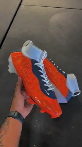 Orange and Blue Nike Fomaposite cleats 🤙🏾 #GridironCleats #footballcleats #customcleats 