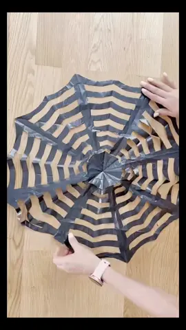 DIY Halloween decor spiderweb made out of a trash bag #HalloweenDecor #DIYHalloween #HalloweenDIY #Halloween #spiderweb 
