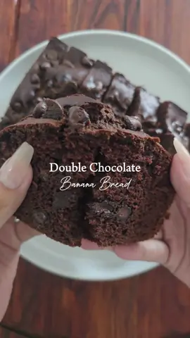 Delicious Easy Double Chocolate Banana Bread Recipe | Craving something sweet? Let's bake this easy and delicious banana bread!  Ingredients  1 1/4 cup flour  1/4 cup cocoa powder 3/4 cup brown sugar 1/2 cup unsalted butter (room temperature)  1 tsp baking soda 1/2 tsp salt  2 lrg ripped bananas (smashed)  1/2 tsp vanilla extract  2 lrg eggs  1 cup semi-sweet chocolate chips  #bananabread #baking #Recipe #foodtutorial #EasyRecipe 