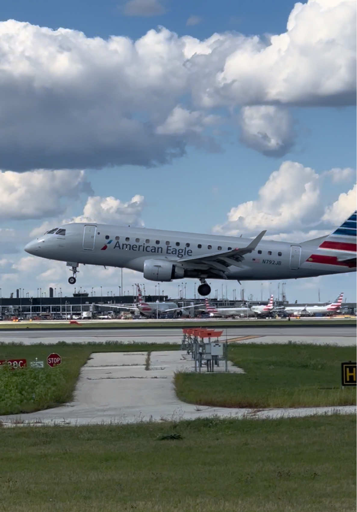 Just going for a walk on the runway at O’hare. Checking out this Embraer E170SE land. #aviation #jet2holidays #embraer #ohare #planes 