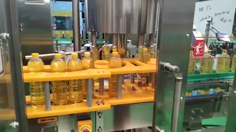 Llenadora ,etiquetadora y empaquetamiento del aceite  Embajadora para aceite 