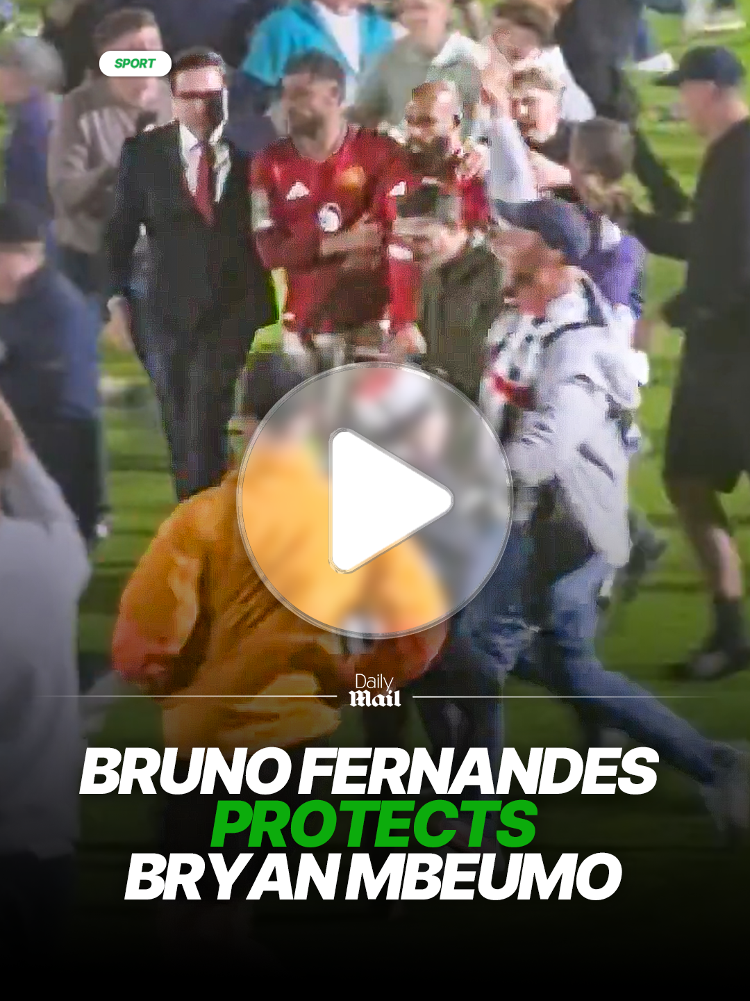 Bruno Fernandes rushed to PROTECT Bryan Mbeumo during a pitch invasion 😲 #brunofernandes #bryanmbeumo #manchesterunited #news #grimsby