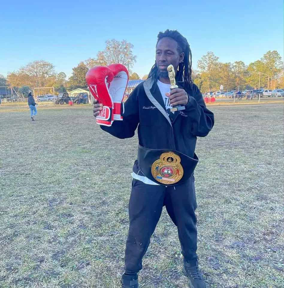 Da Champ @johnell out of Cross City Florida said he wanted some merch to rep his city!! Say less Champ we added some animation 3d style to the champ 🏆  #whatdabizztv #boxingchamp #fyp #graphicdesign 