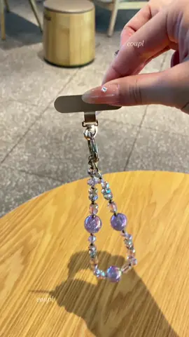 Bold purple beads that make your phone feel like jewelry. #phonecharm  #phonegrip  #phonestrap  #phoneaccessories  #YT 