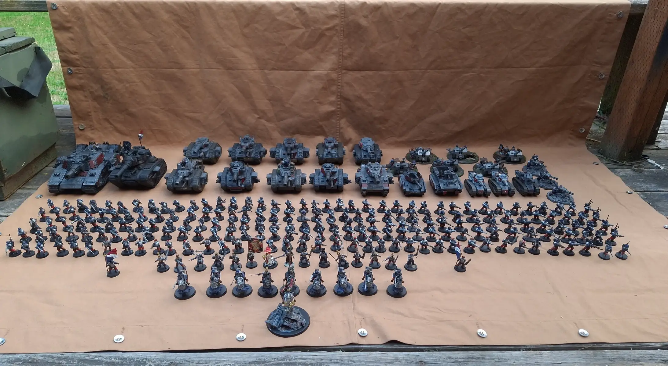 Current state of my Imperial guard army. with another 90 guard to go once I get them. I havent even bothered to do the numbers yet 🤣