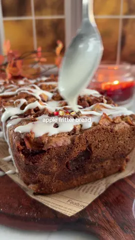 Calling all apple girlies , this one is for you  Bread Batter 1/2 cup unsalted butter, softened 3/4 cup granulated sugar 2 large eggs 1/3 cup sour cream or Greek yogurt 1 tsp vanilla extract 1 1/2 cups all- purpose flour 1 1/2 tsp baking powder 1/2 tsp baking soda 1/2 tsp salt Cinnamon Sugar Swirl 1/2 cup light brown sugar, packed 1 1/2 tsp ground cinnamon For the apples 2 medium apples, peeled, cored, and diced (about 1 ½ cups) 2 tbsp granulated sugar 1/2 tsp cinnamon For the Glaze 1/2 cup powdered sugar 1-2 tbsp milk 1/4 tsp vanilla extract Instructions Prep your pan: Preheat the oven to 350°F (175°C). Grease and line a 9×5-inch loaf pan with parchment paper. Make the cinnamon sugar swirl: In a small bowl, mix together the brown sugar and cinnamon. Set aside. Toss the apples: In another bowl, stir together the diced apples with granulated sugar and cinnamon until evenly coated. Set aside. In a large mixing bowl, cream together butter and granulated sugar until light and fluffy, about 2 minutes.Beat in the eggs one at a time, then add sour cream and vanilla extract. In a separate bowl, whisk together flour, baking powder, baking soda, and salt.Add dry ingredients to the wet ingredients in two additions, alternating with the milk. Mix until just combined. Pour half the batter into the prepared pan. Sprinkle half the cinnamon sugar mixture on top, then half the apples.Spread the remaining batter over the apples, then top with the rest of the apples and the cinnamon sugar. Bake for 50–60 minutes, or until a toothpick inserted in the center comes out mostly clean (a few moist crumbs are fine). If the top starts browning too quickly, loosely cover with foil halfway through. Let the bread cool in the pan for 15 minutes, then transfer to a wire rack. Once cooled, whisk together the powdered sugar, milk, and vanilla to make the glaze. Drizzle over the cooled loaf before slicing. #caitlinstable #applefritter #applefritterbread #appledessert #falldesserts 