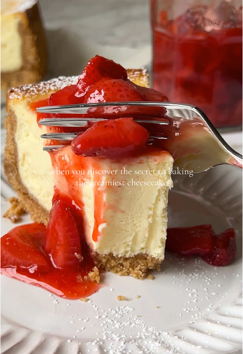 Low and slow! This cheesecake is baked at 305F for 1 hour 40 minutes and then it sits inside an off oven for another hour. It yields the CREAMIEST texture that isn’t wet or underdone. Even better - no cracks! PS - This is my New York style cheesecake recipe 