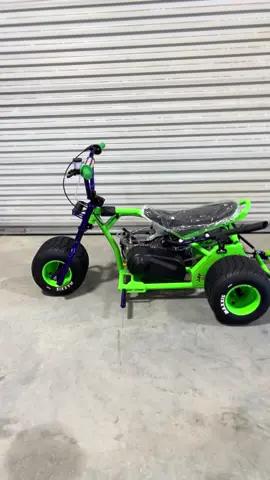 Check out this electric green and dirty magic purple mini trike 