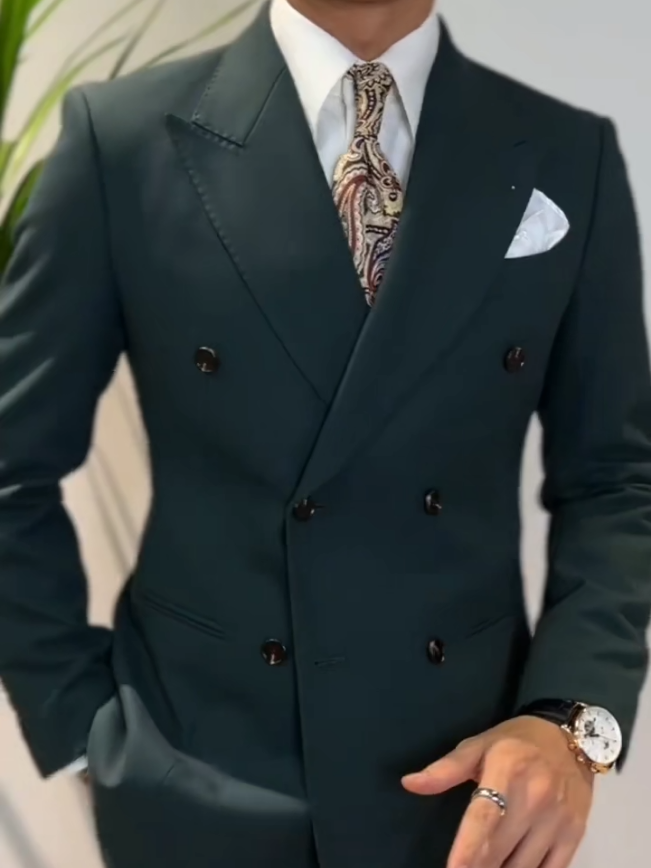 ✨ Elevate your style game with this dope double - breasted suit! 🔥 The deep green hue, paired with that sick paisley tie and crisp pocket square, is a vibe. Whether it's for a wedding, biz meeting, or just to slay the day.   #SuitStyle #MensFashion #OOTD #FashionInspo #DressToImpress #TikTokFashion #GentlemanStyle@tiktok creators 
