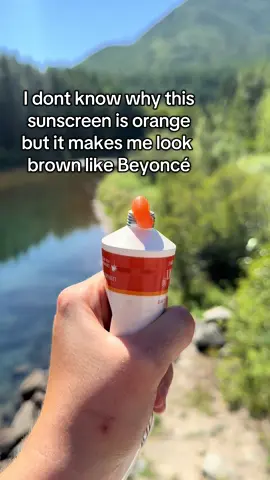 Getting my tan on 🥰🤞🏻 #sunscreen #orangesunscreen #fyp #viral #summerhacks 