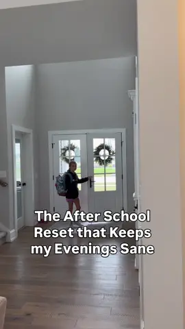 The hours right after school can set the tone for the whole evening. A few simple systems can make that shift from school mode to home mode calmer for everyone: 1. Create a Transition Ritual A short 5–10 minute routine signals the shift. My girls put away their coats and shoes, unload their backpacks, and put papers I need to see into a tray in our office. This allows me to look at the papers later without them cluttering up the counter. 2. Have a Snack Station Ready Prepped bins in the fridge or pantry show the girls what they can have that are approved by me.  3. Build in Decompression Time I have all my girls separate to different rooms to each have some time alone to regroup before the rest of the evening. This has made a huge difference and is a reset we didn’t know we needed! They may watch a show or catch up on reading or homework if they have it.  A little planning on the front end makes the after-school window so much more peaceful!  #momhack #routine #afterschool #twinmom #kidsroutine   