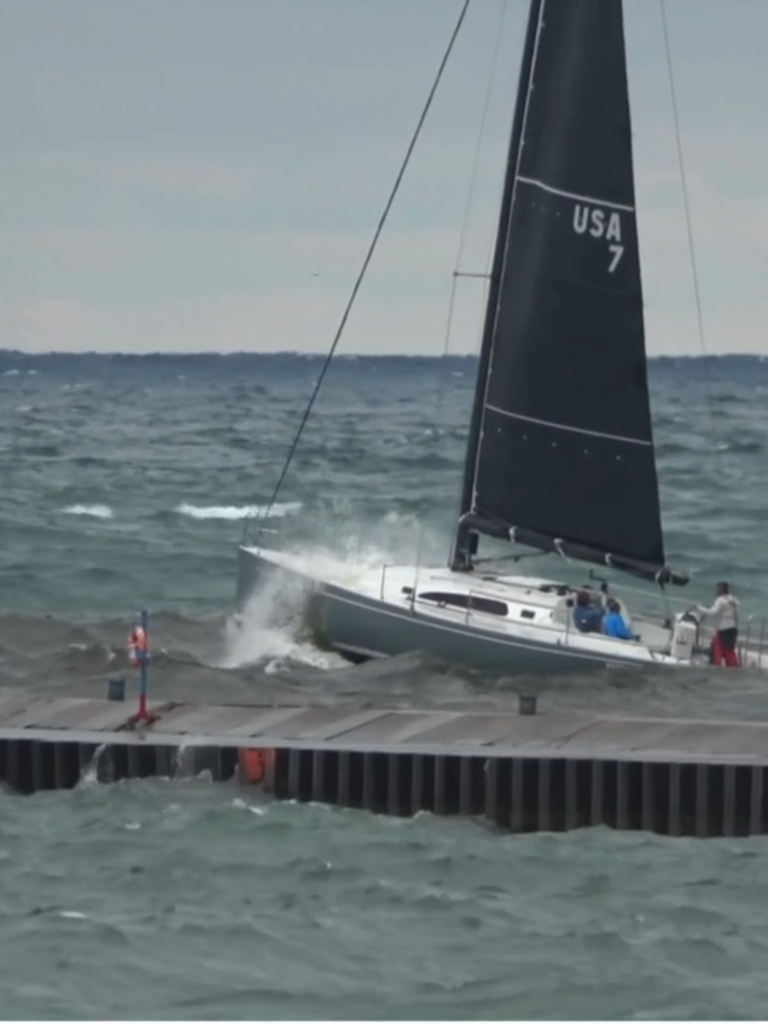 ROUGH SEAS: Video from Thursday showed two sailboats having a rough time on Lake Michigan as big, crashing waves rocked them back and forth.
