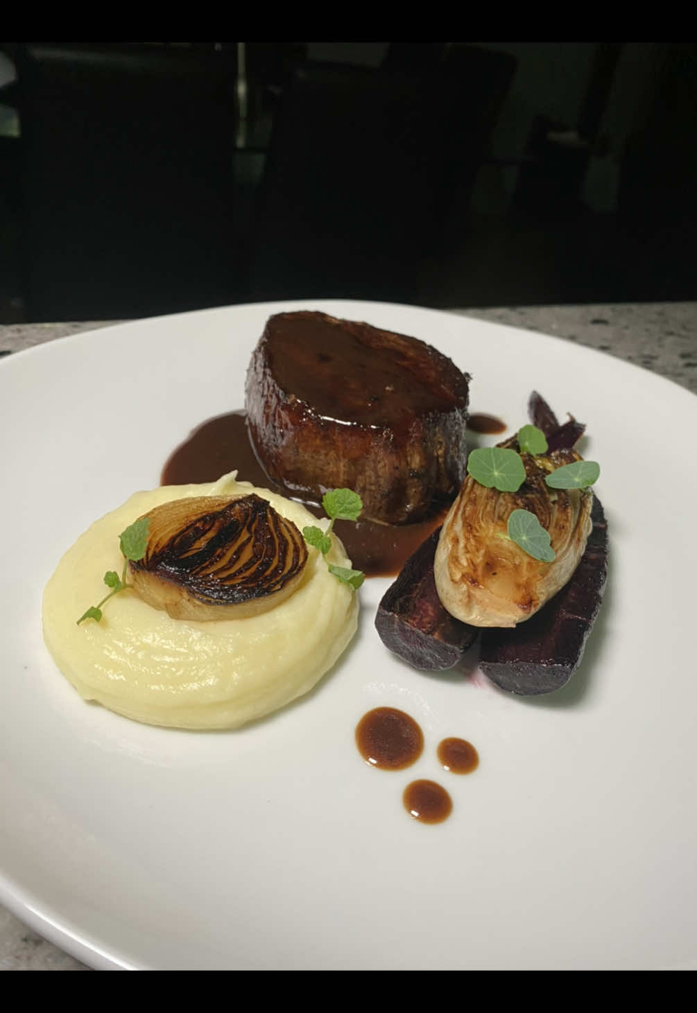 Steak Dinner Plating ♥️🫰🏽 Filet Mignon  Roasted Purple Carrot Torched Witlof Caramelized Cippoline Onion Potato Puree Demiglace  Cast Iron Pan is tried and true despite all the fancy techniques you can do, this is the best way to make the most perfect thick cut eye round filet with a beautiful butter baste to finish!  #beef #plating #asmr #theartofplating #castiron 