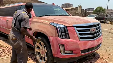 African men build their own Cadillac Escalade EXT limousine using wood. #Ichasulilwe 
