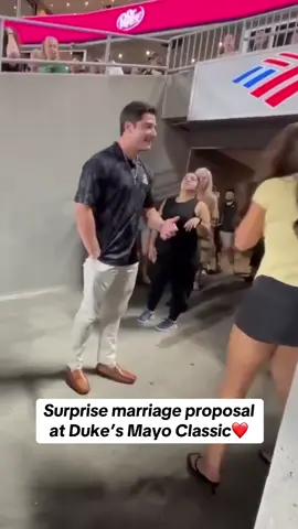Lady in the back 😅 via mayoclassic #CollegeFootball #marriage #proposal 