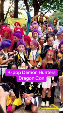 KPop Demon Hunters photo group at golden hour at Dragon Con. It's the biggest KPDH cosplay group in the US to date!  #kpdh #dragoncon #sodapop #huntrx #kpopdemonhunters 